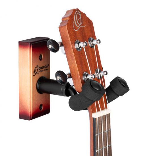 Ortega OUH-1CSB - Wieszak na ścianę do ukulele typu HAK w kolorze cherry sunburst.